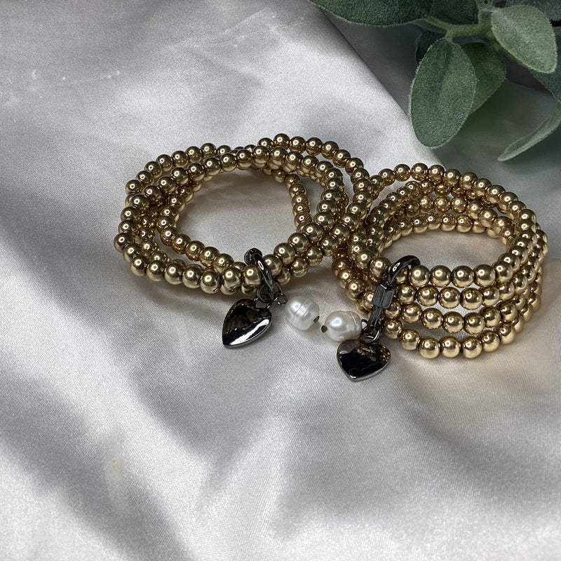 Four gold strand Bracelets w/pearls and hearts