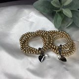 Four gold strand Bracelets w/pearls and hearts